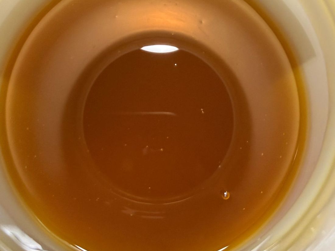 Crude unrefined linseed oil, feed grade, yellow to amber